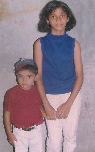 A childhood picture of Divya Suresh and her brother