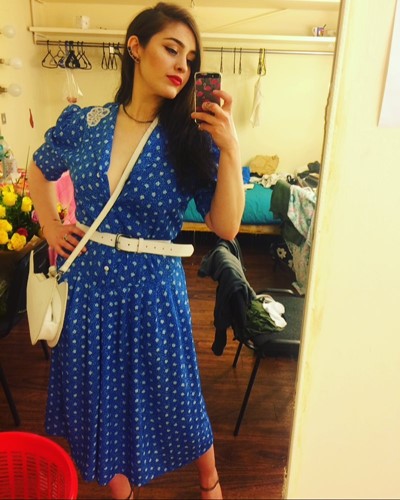 Danielle Galligan taking selfie in Blue Dress