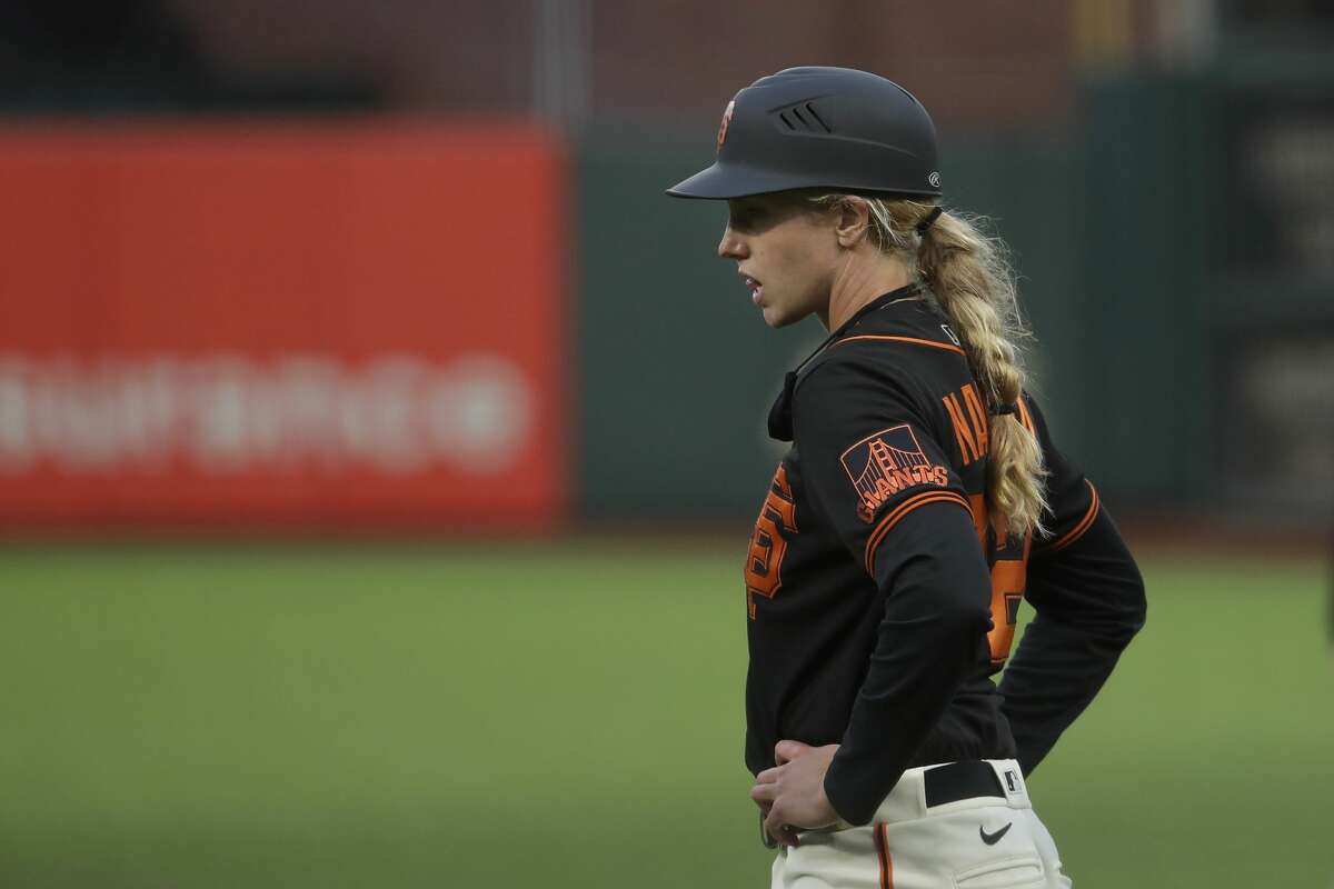 Alyssa Nakken becomes the first woman to coach on the field in MLB history  – WABE